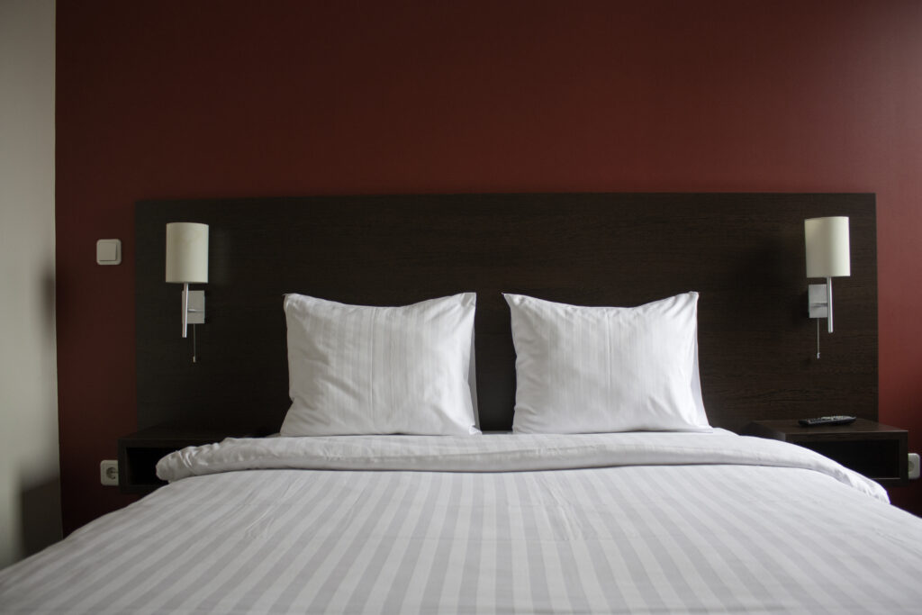 Too Big, Too Small, Just Right—The Perfect Bed Size for You Double bed in the hotel room. Perfect Bed Size